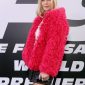 Charlize Theron Wear Red Fur Jacket at F9 Event