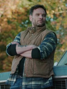 Ben Cotton Wearing Brown Vest In Resident Alien Pilot