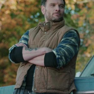 Ben Cotton Wearing Brown Vest In Resident Alien Pilot