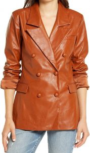 A Young Girl Wearing Vintage Tan Brown Leather Blazer