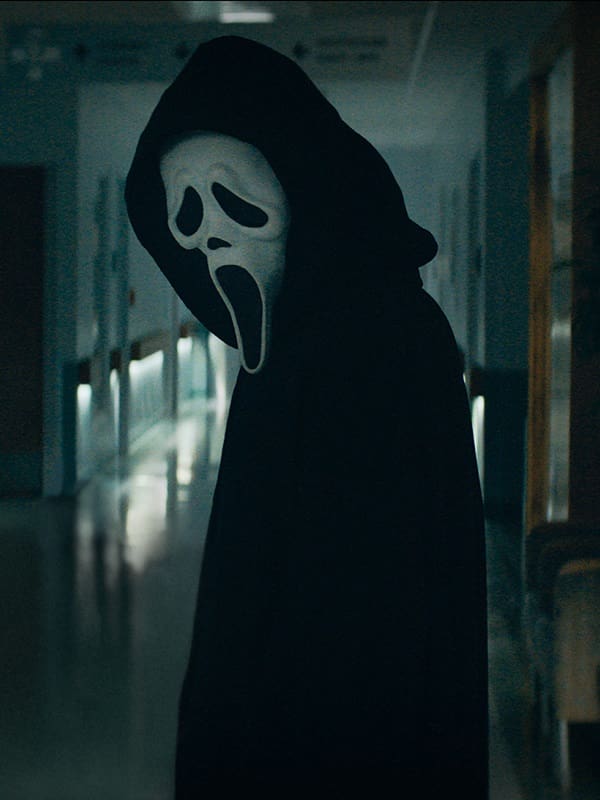 A Men Wearing Scream Movie Ghostface Costume