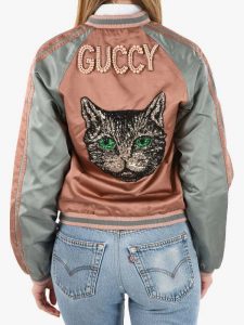 A Women Wearing Guccy Cat Pearl Bomber Jacket