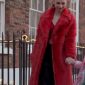 Juno Temple Wearing red fur coat In Ted Lasso as Keeley Jones