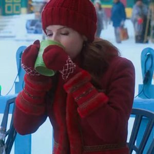 Noelle Kringle wearing a red Jacket